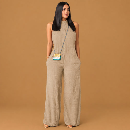 Trendy sleeveless halter ruffled young womens cami jumpsuit featuring a flattering silhouette and breathable material ideal for effortless summer styling and comfort