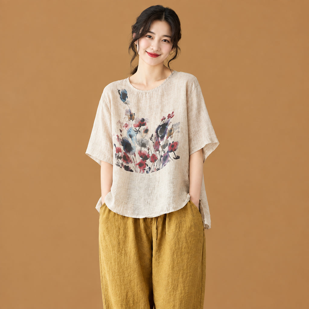 Women's vintage ink print asymmetric short-sleeve t-shirt featuring an artistic brushstroke pattern and a unique uneven hemline for an edgy, avant-garde style