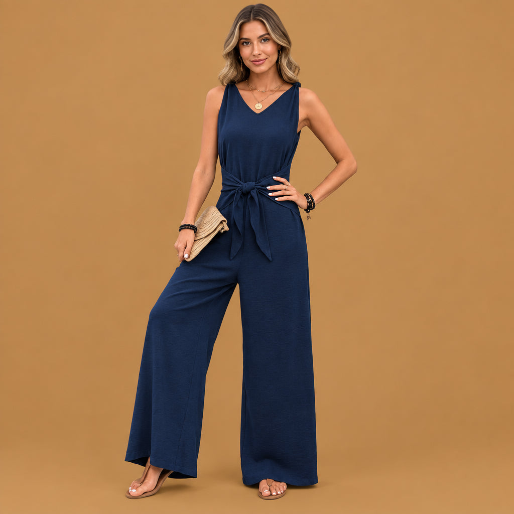 Casual wear blue v-neck twist strap jumpsuit for women equipped with reinforced stitching seams and a flattering fit that complements various body shapes