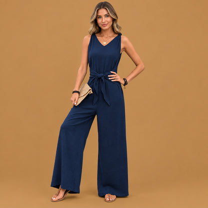 Casual wear blue v-neck twist strap jumpsuit for women equipped with reinforced stitching seams and a flattering fit that complements various body shapes
