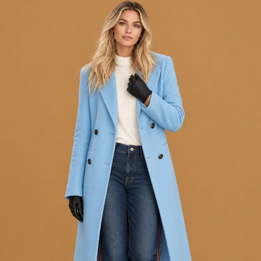 Elegant double breasted women winter wool outerwear coat built with skin-friendly fabric, featuring classic lapel collar aesthetics and smooth texture throughout