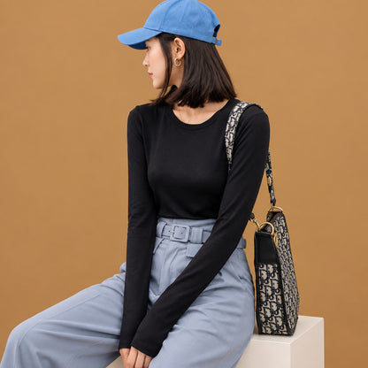 Comfortable lightweight viscose crew neck long-sleeve fitted t-shirt featuring a smooth texture and flexible fit for women
