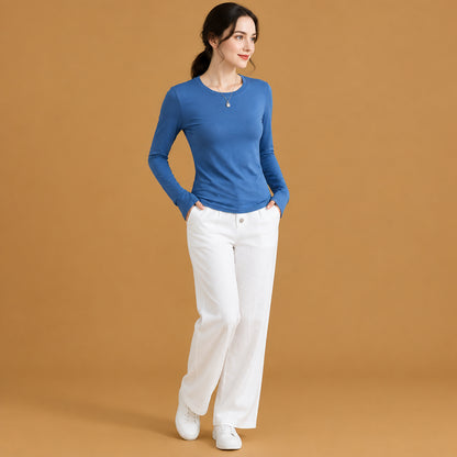 Solid color slim fitted long-sleeve basic shirt with a classic crew neckline offering a sleek and versatile look for any casual outfit