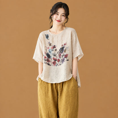 Women's vintage ink print asymmetric short-sleeve t-shirt featuring an artistic brushstroke pattern and a unique uneven hemline for an edgy, avant-garde style