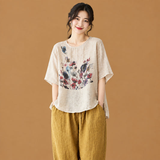 Women's vintage ink print asymmetric short-sleeve t-shirt featuring an artistic brushstroke pattern and a unique uneven hemline for an edgy, avant-garde style