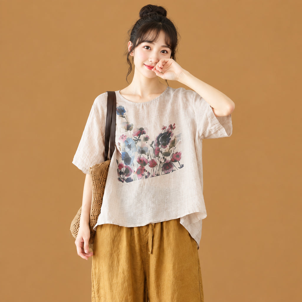 Artistic ink graphic women's short-sleeve tee designed with a chic asymmetrical cut and soft, breathable fabric for a modern streetwear look