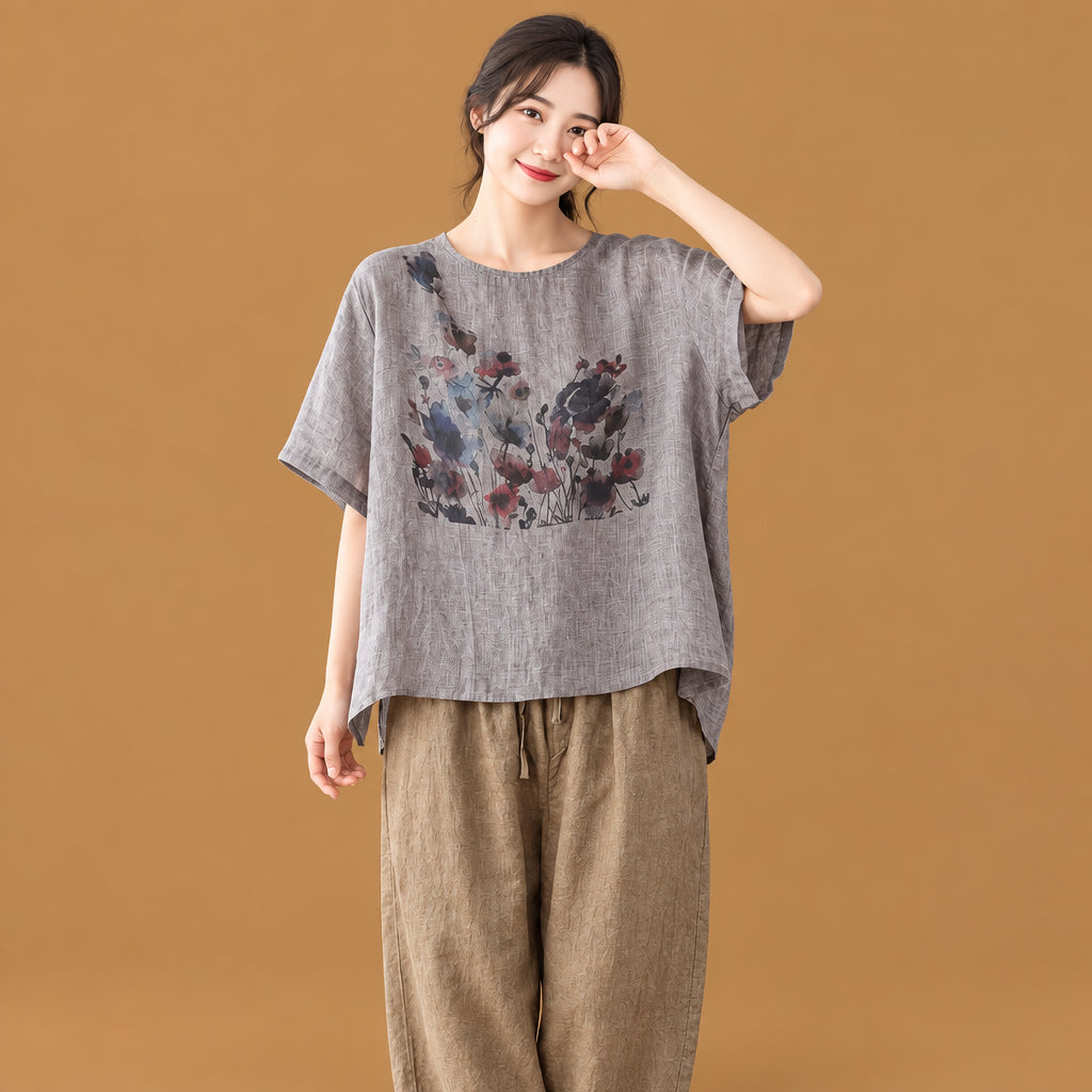 Unique asymmetric short-sleeve t-shirt for women adorned with a classic ink print pattern and lightweight material for all-day comfort